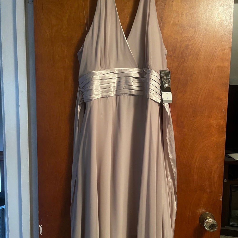 Size 12 dress, new just been hanging in my closet.